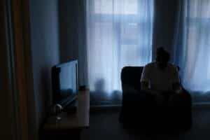 feeling-stressed-in-a-dark-room-with-curtains-drawn
